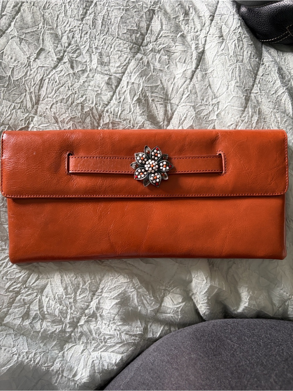 Liz Soto Brown/ Orange Leather Clutch with Floral Jewel Accent